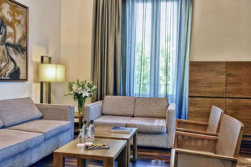 Nh 컬렉션 마드리드 팔라시오 드 테파 외부 사진 A living room at the hotel